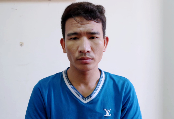 Nghi can Quốc tại cơ quan điều tra. Ảnh: Công an cung cấp